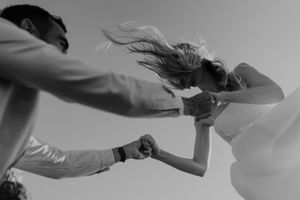 Wedding photographer in Portugal capturing hands touching during an intimate wedding
