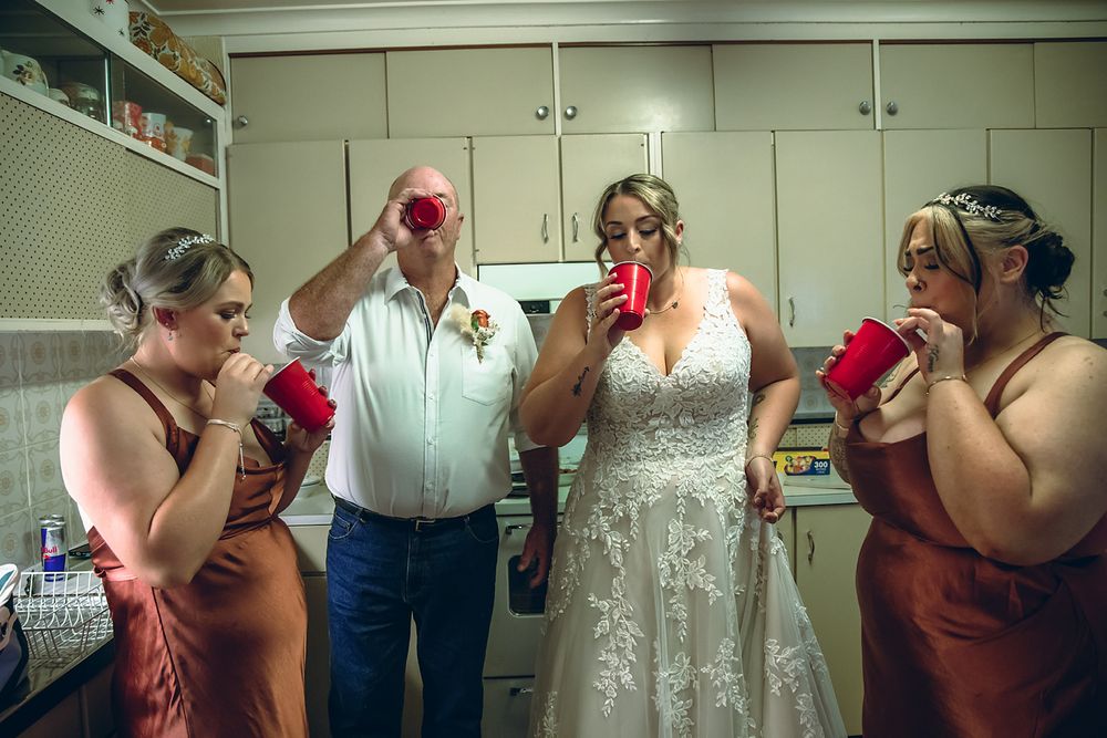 A sequence of six photos showing someone taking a drink from a glass in a kitchen setting.