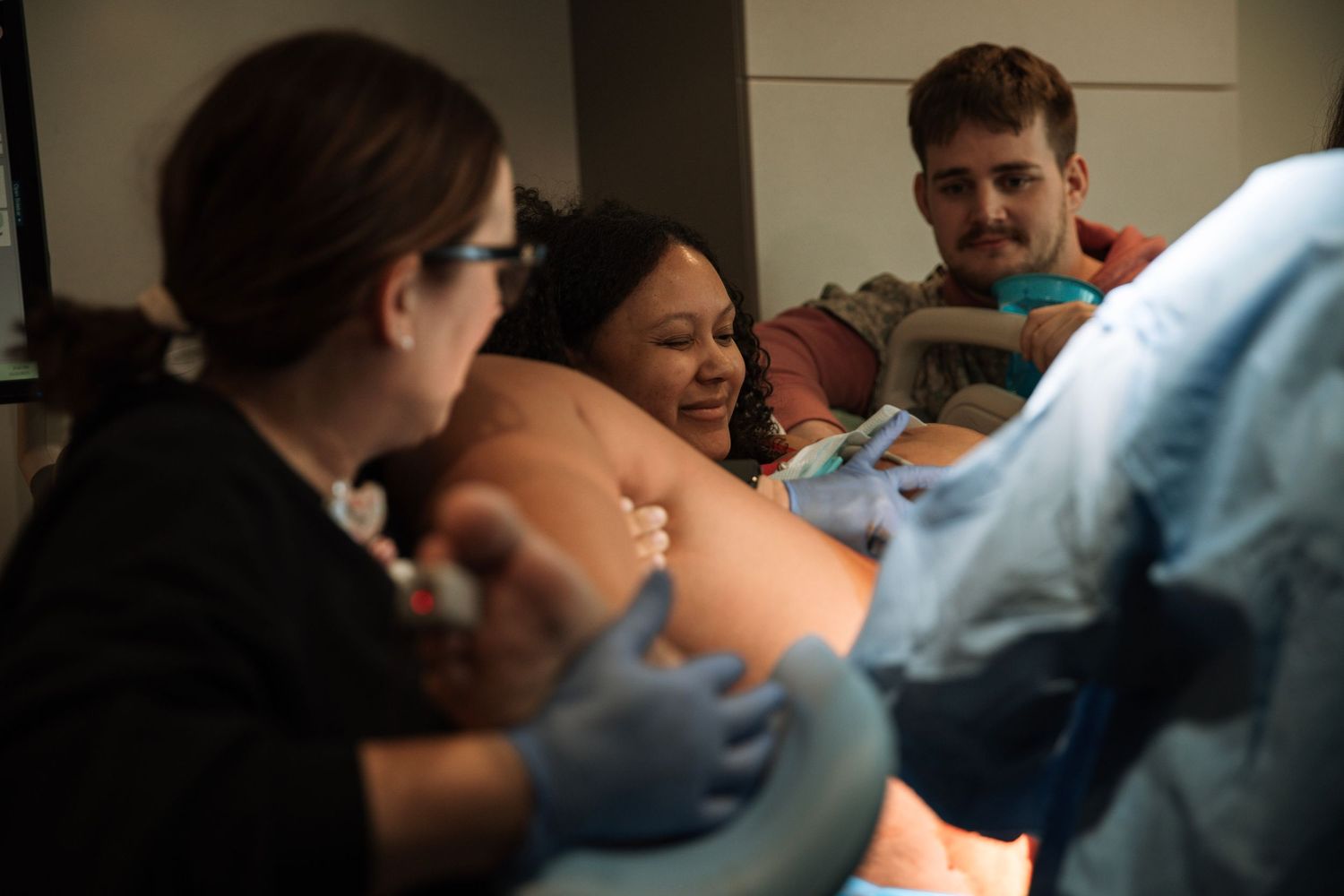 Nashville birth photographer documenting labor and delivery in a Middle Tennessee hospital