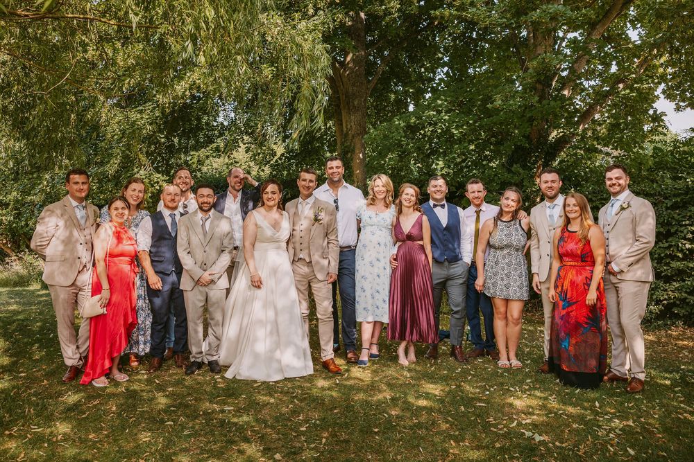 A series of outdoor wedding party group photos arranged in a row showing guests and wedding party members in formal attire.