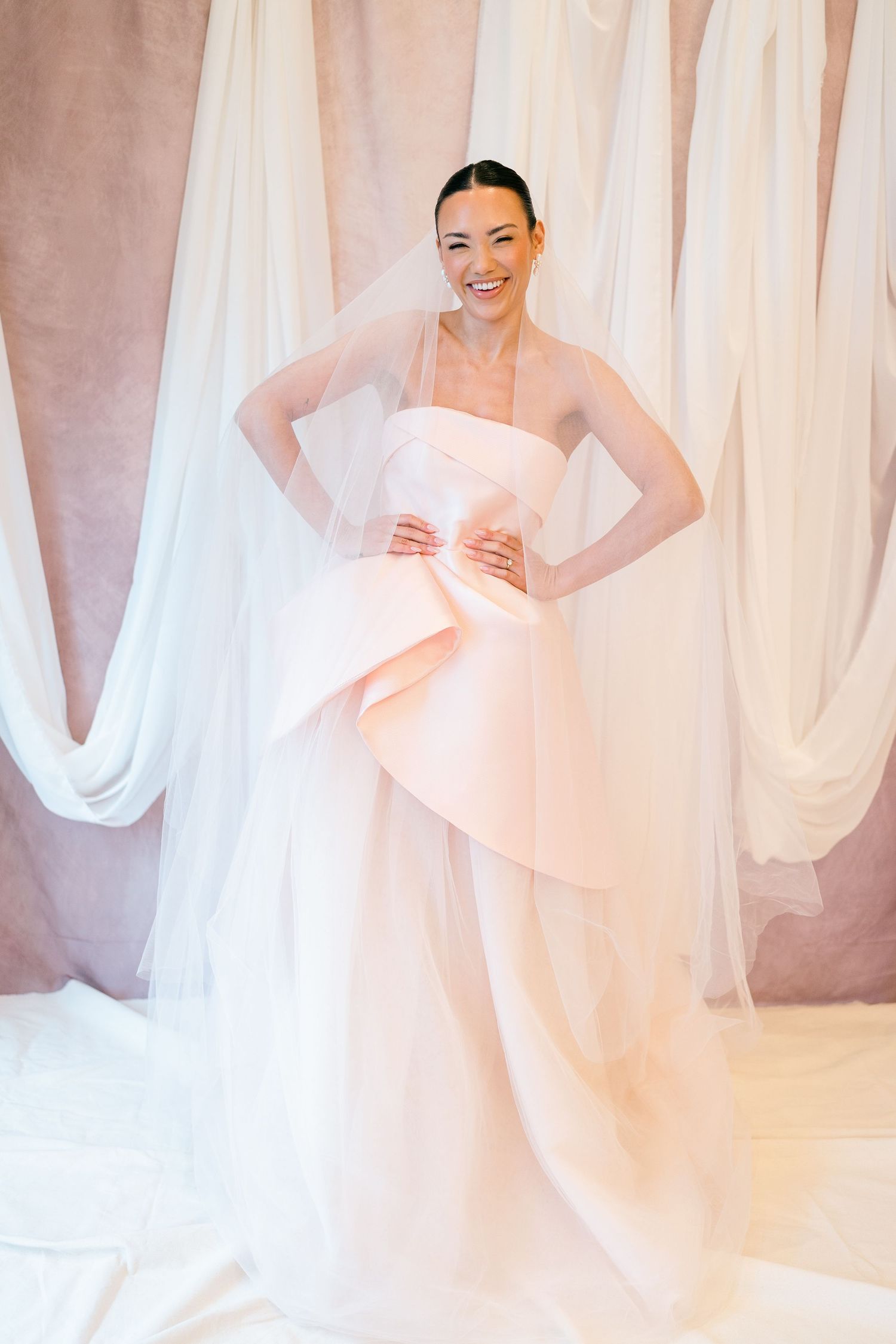 A series of ethereal bridal portraits showing flowing white fabric and soft romantic lighting in a studio setting.