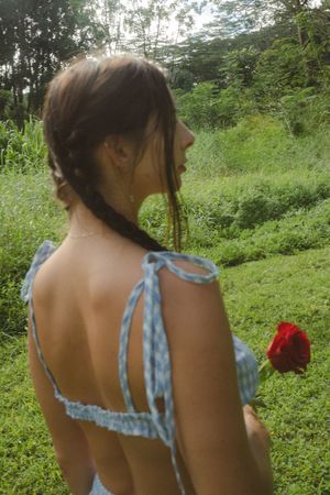 models posing with flowers by Kauai Photographer