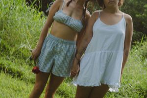 models posing with flowers by Kauai Photographer