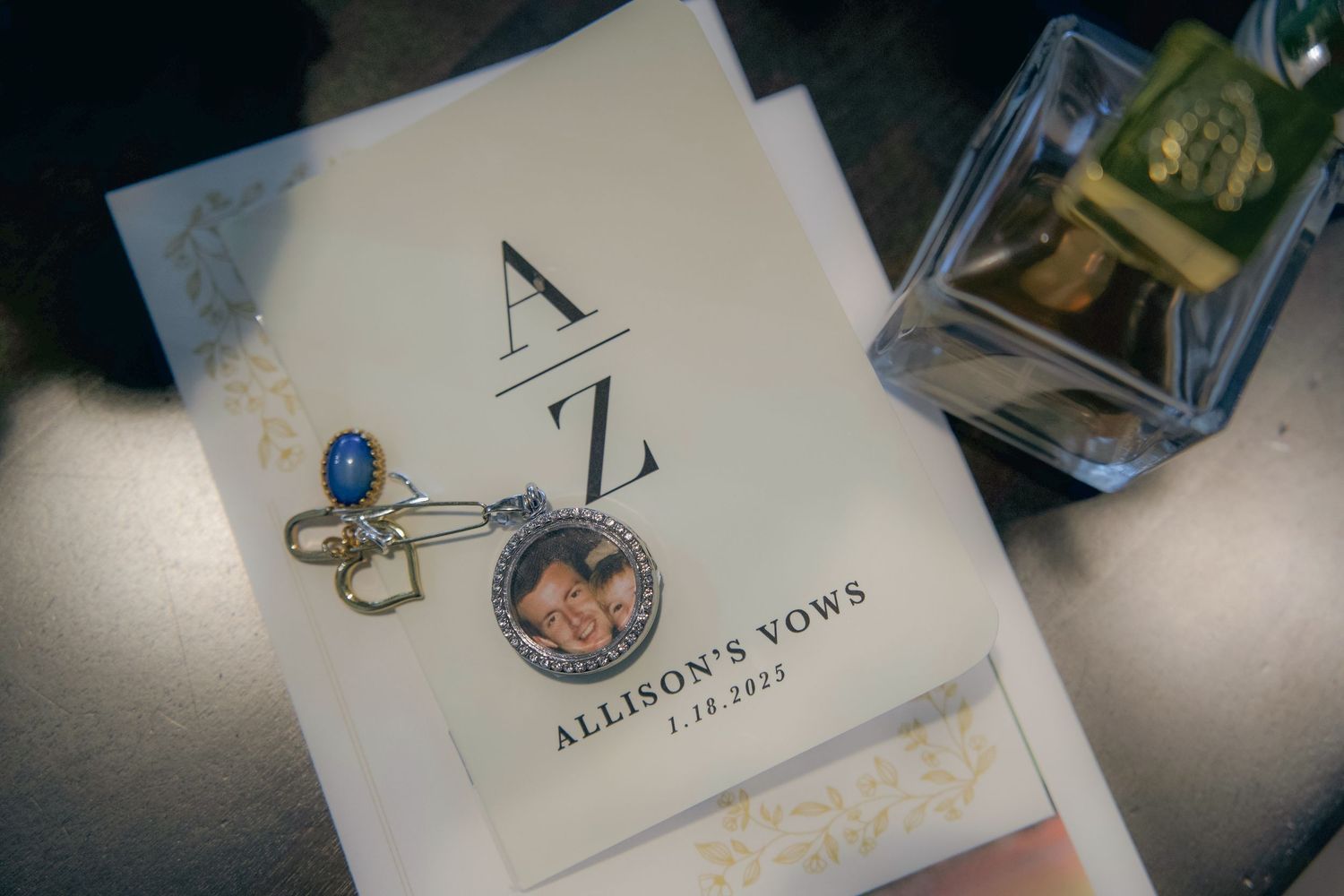 A series of elegant wedding invitation cards and envelopes arranged on a table with calligraphy and monogram designs.