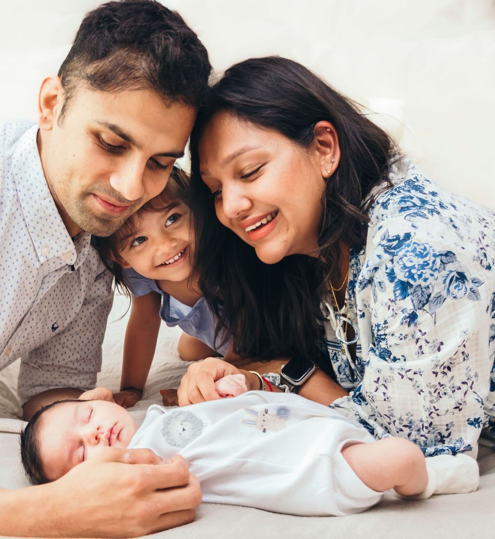 Family photo with new born and toddler