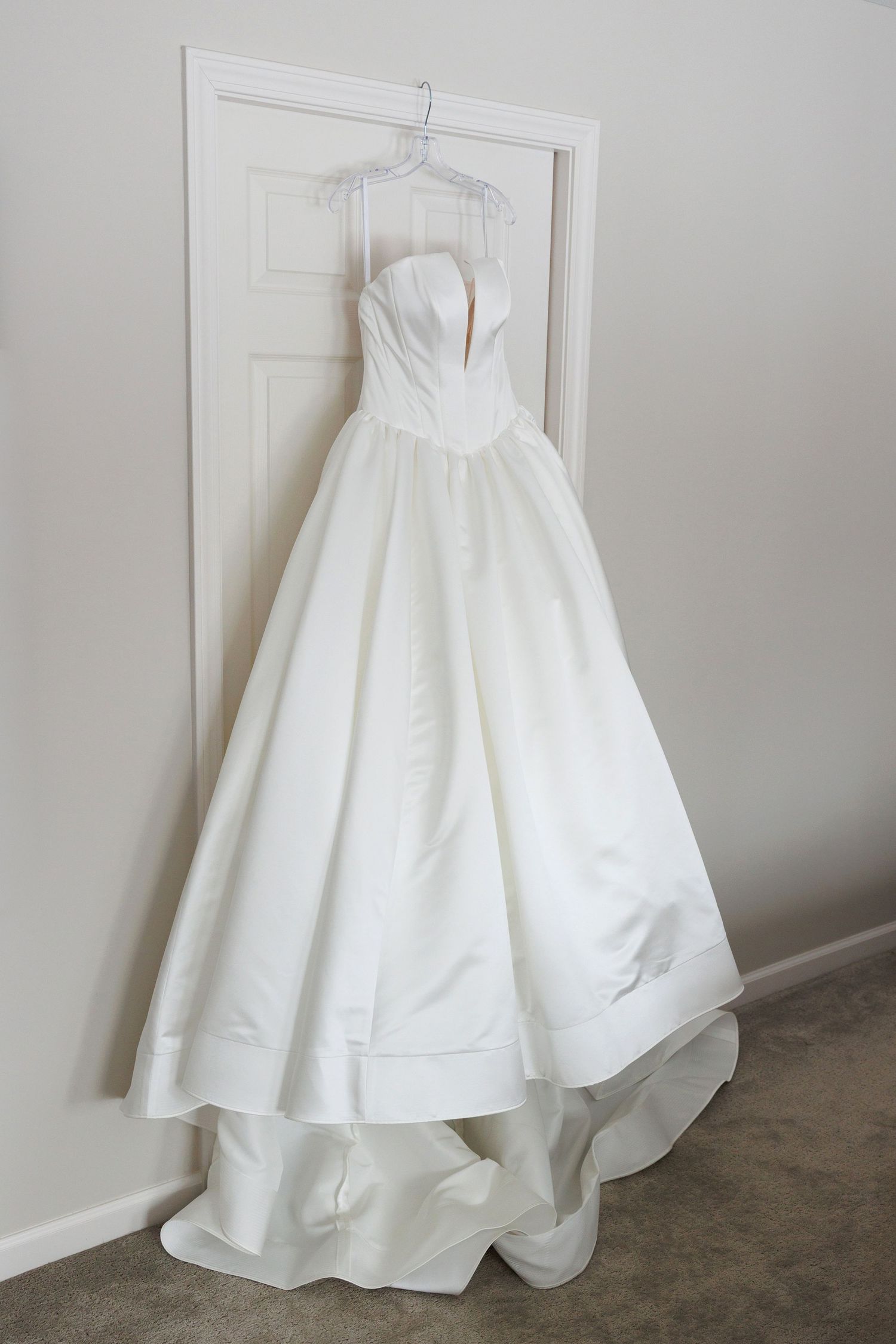 Wedding dress hanging at bride's house in North Canton, Ohio.