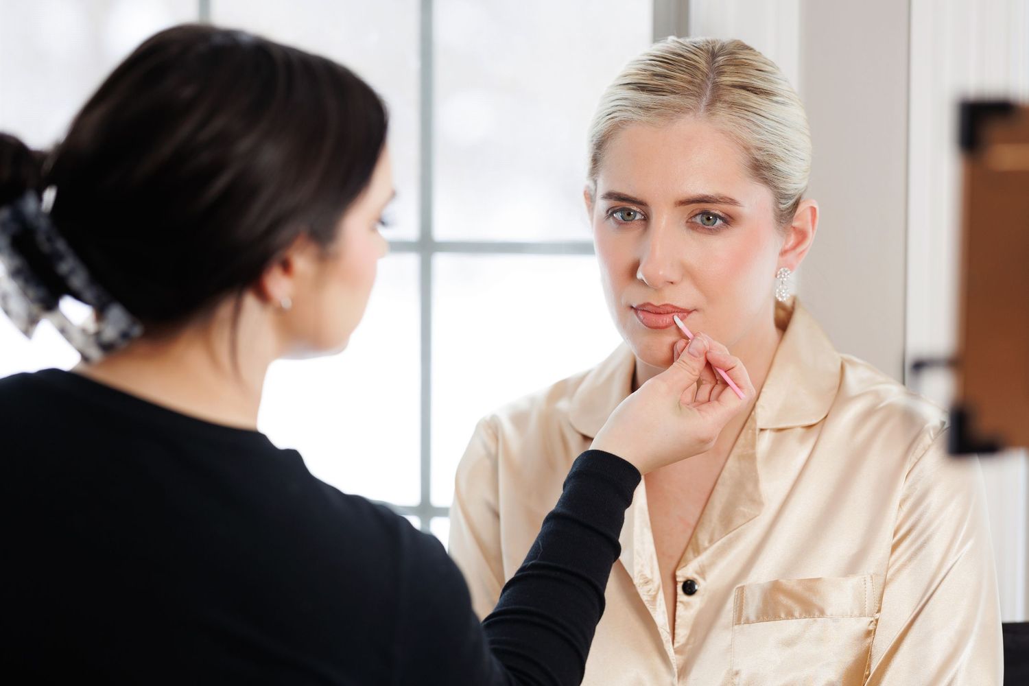 Makeup being applied to bride in North Canton, Ohio.