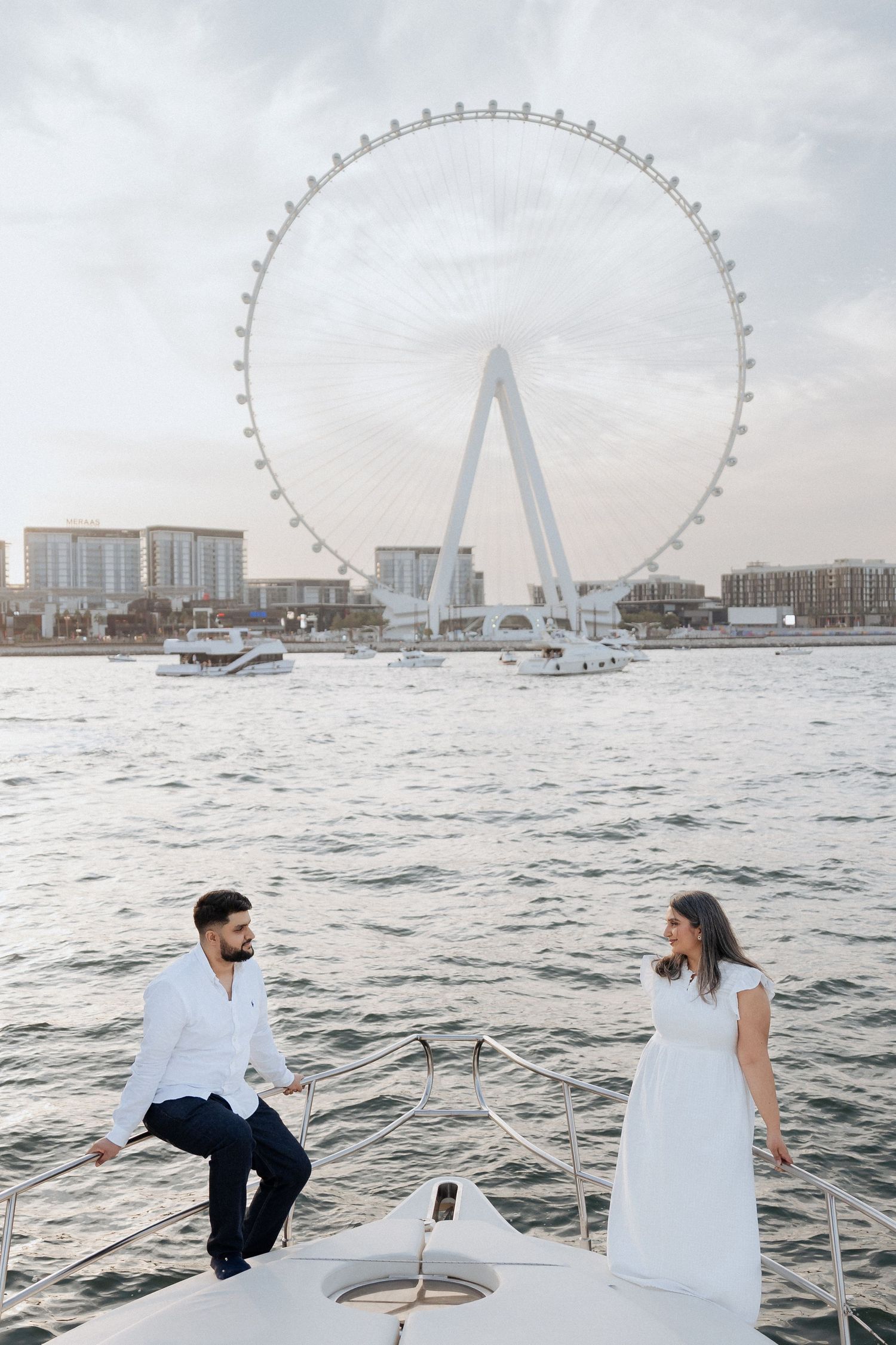 Dubai engagement proposal near Ain Dubai with waterfront skyline backdrop