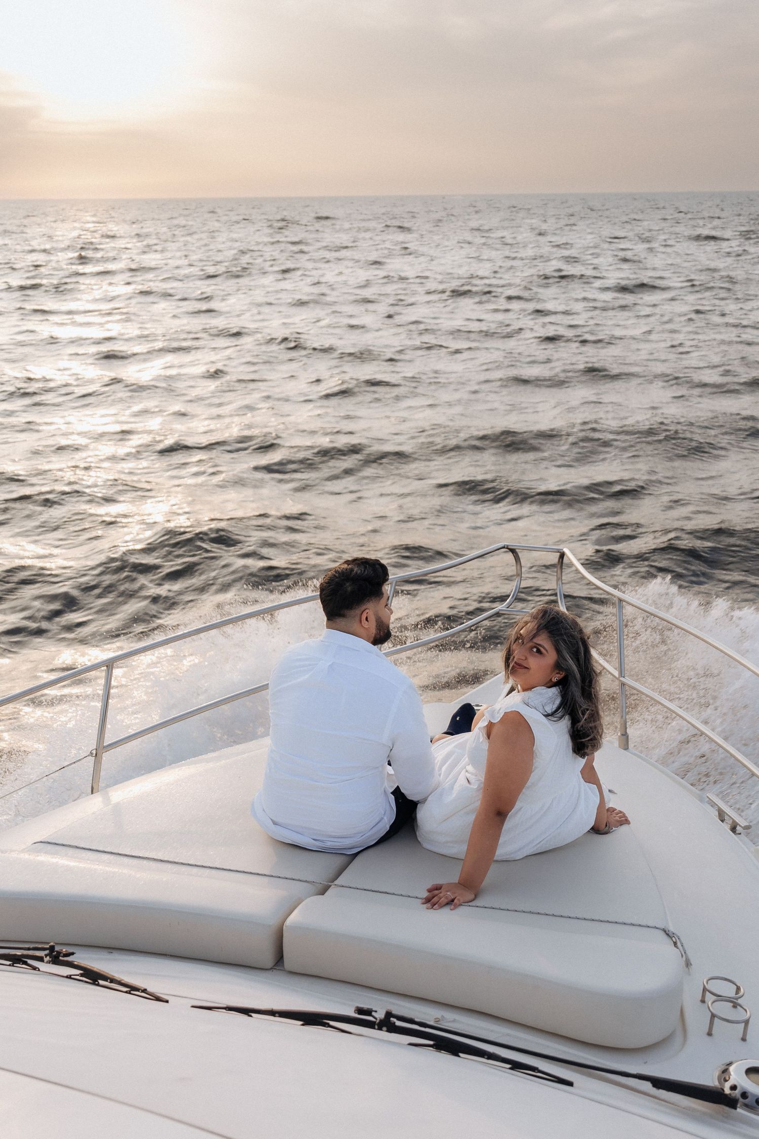 Luxury yacht engagement photoshoot in Dubai during golden hour