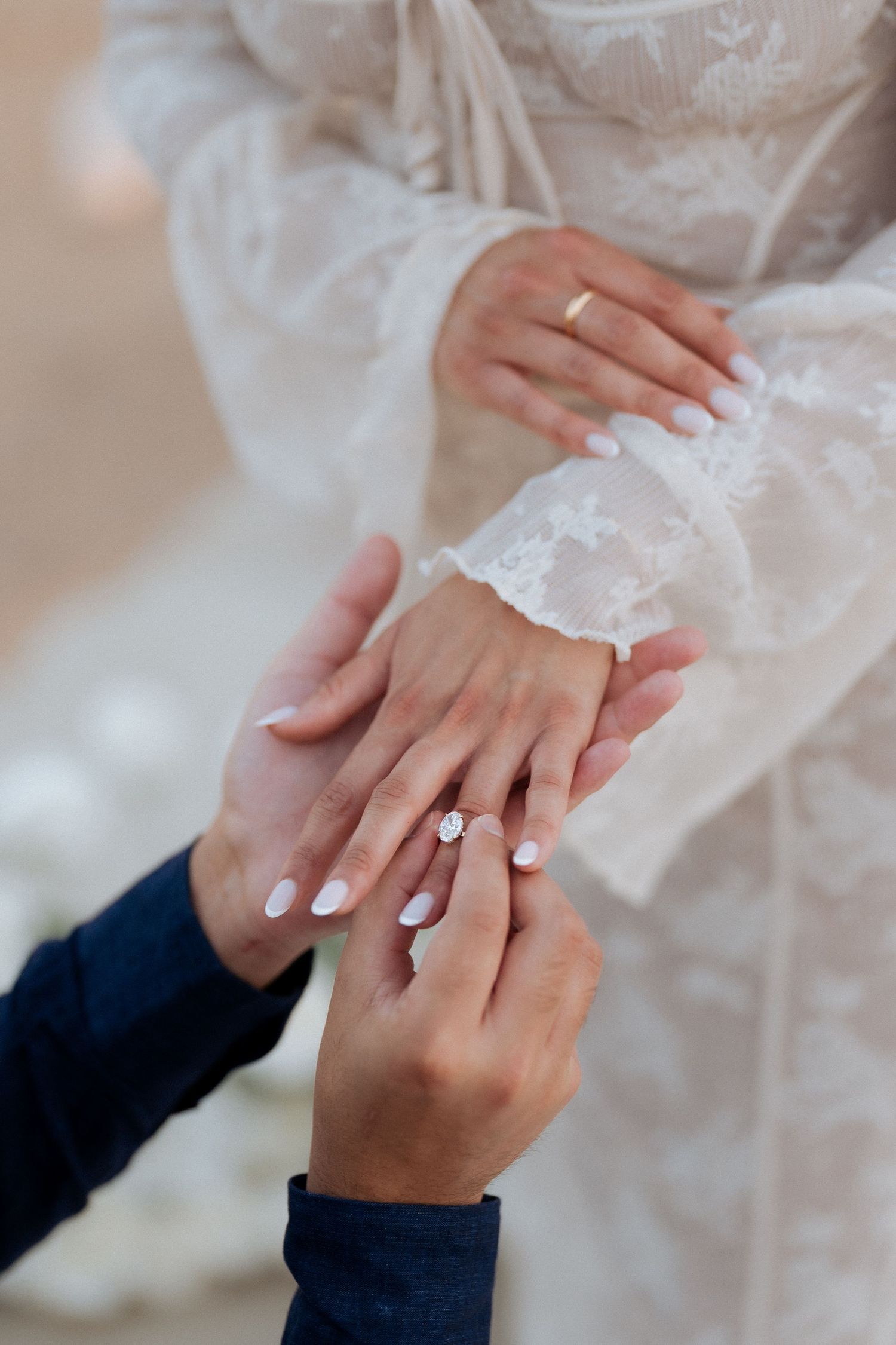 Surprise proposal photoshoot in Dubai – close-up of hands with engagement ring