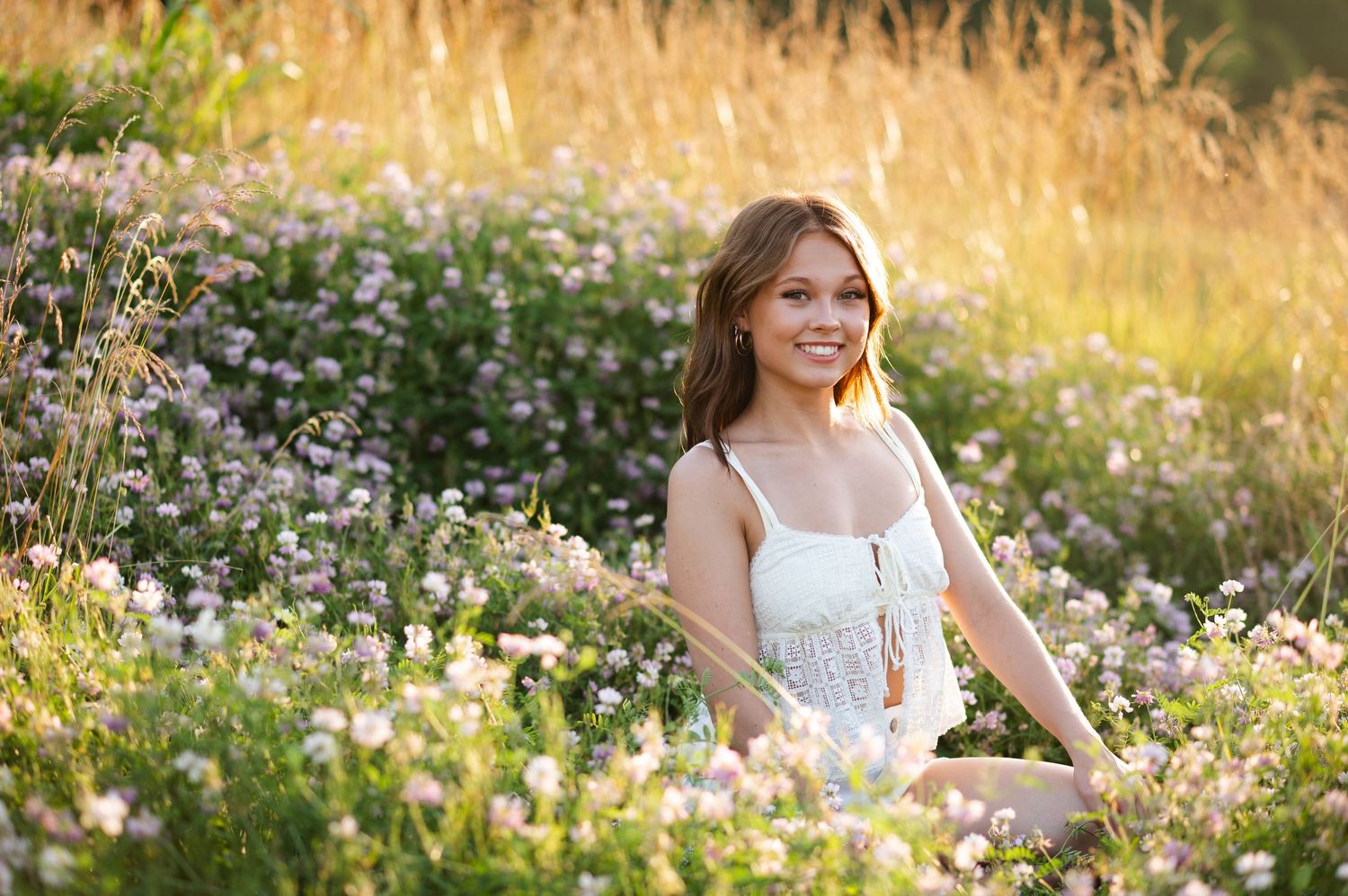 Girl senior portrait in flowers