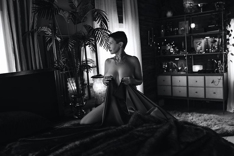 Five black and white film stills showing dramatic lighting and silhouettes in a dark moody interior setting.