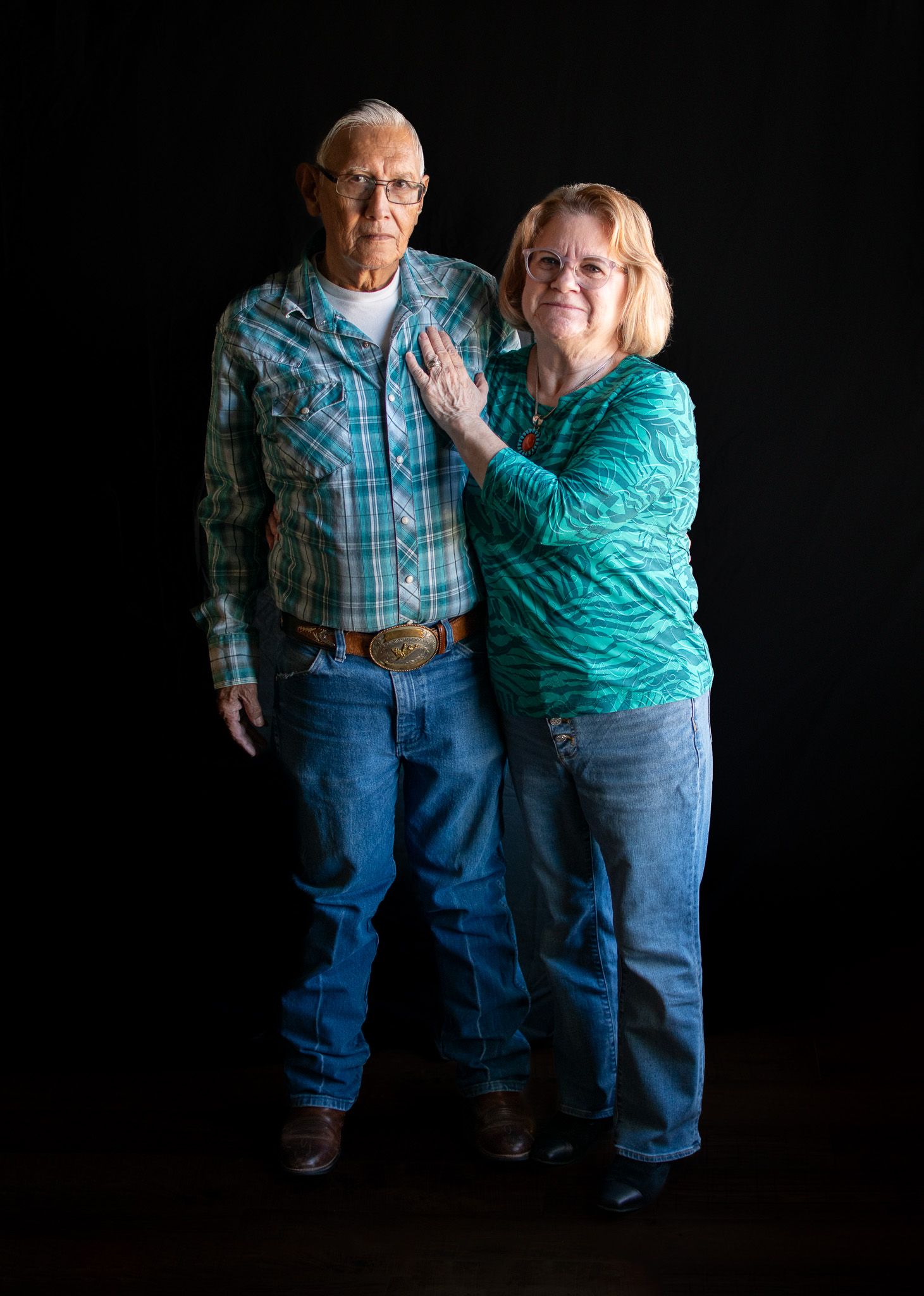 studio portrait, anniversary, elderly couple, turquoise, standing
