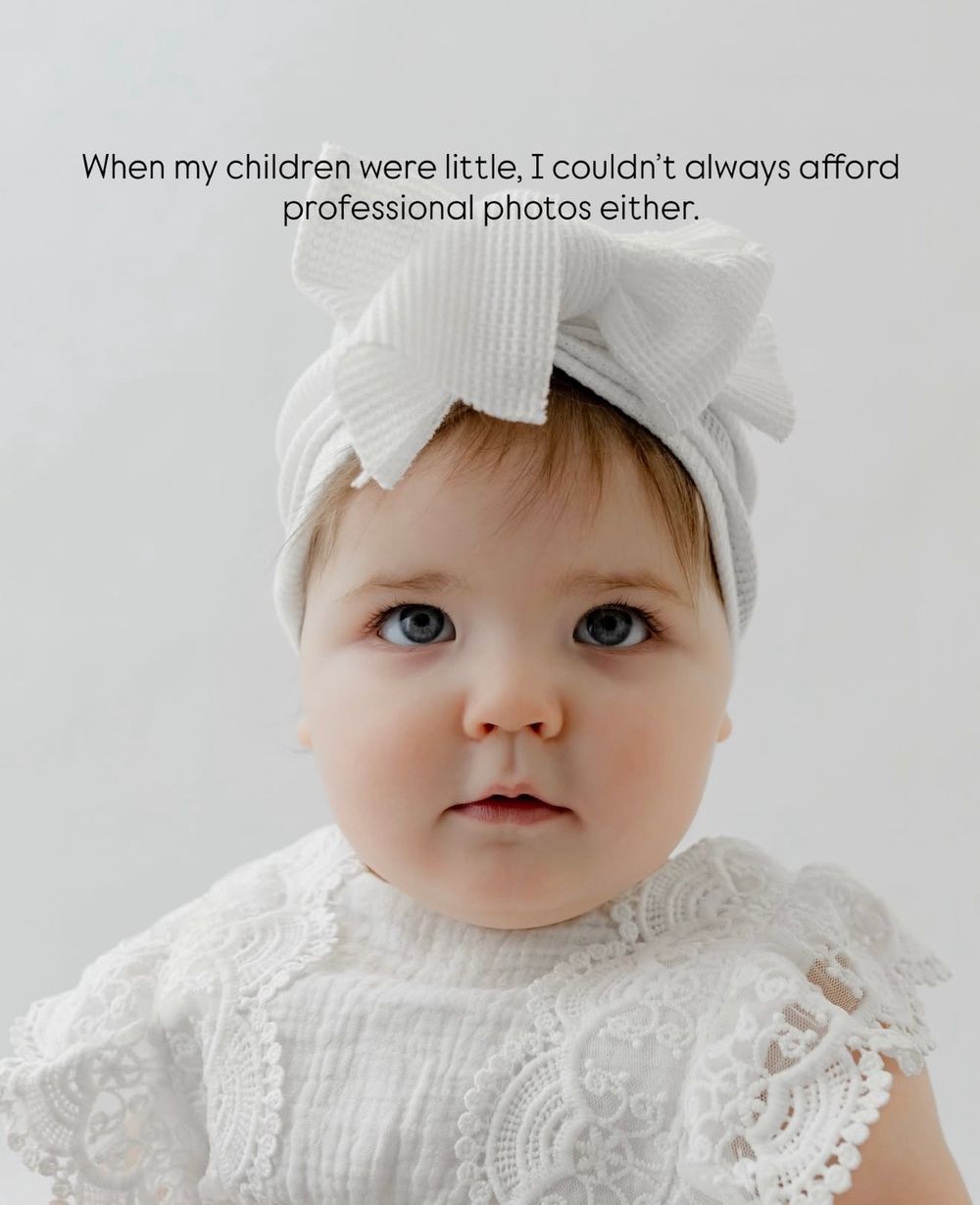 Close-up shot of baby in white lace dress and bow against light background with text overlay.
