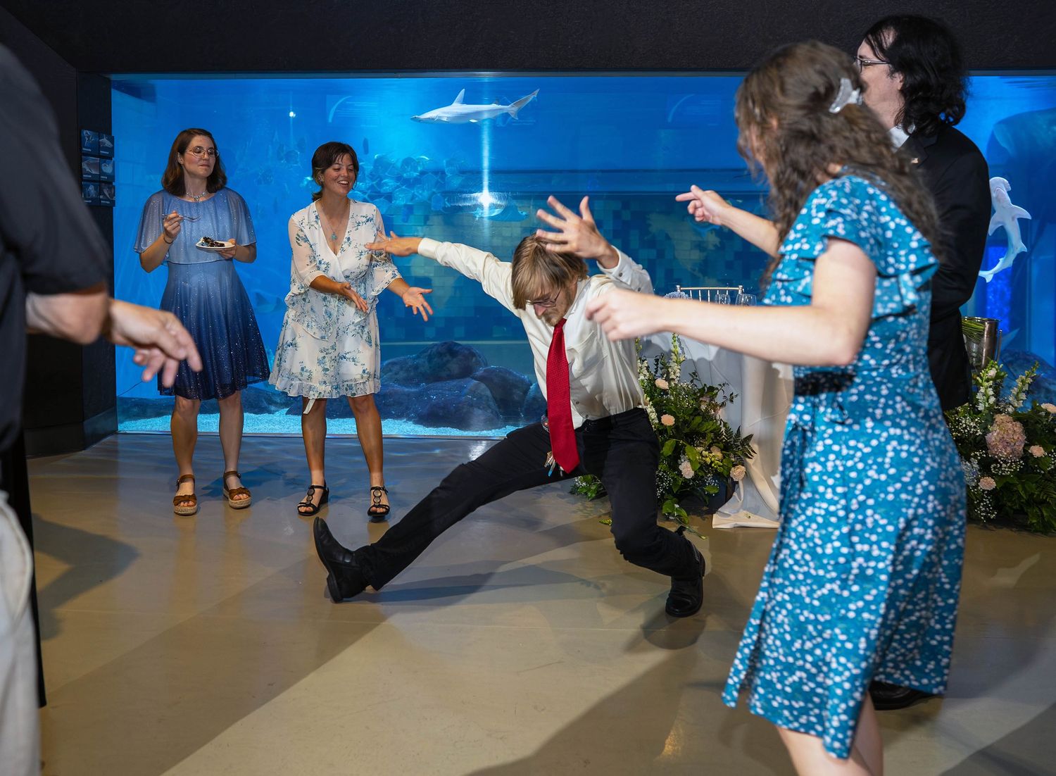 guests dancing at an aquarium wedding venue at Toledo Zoo Wedding Venue