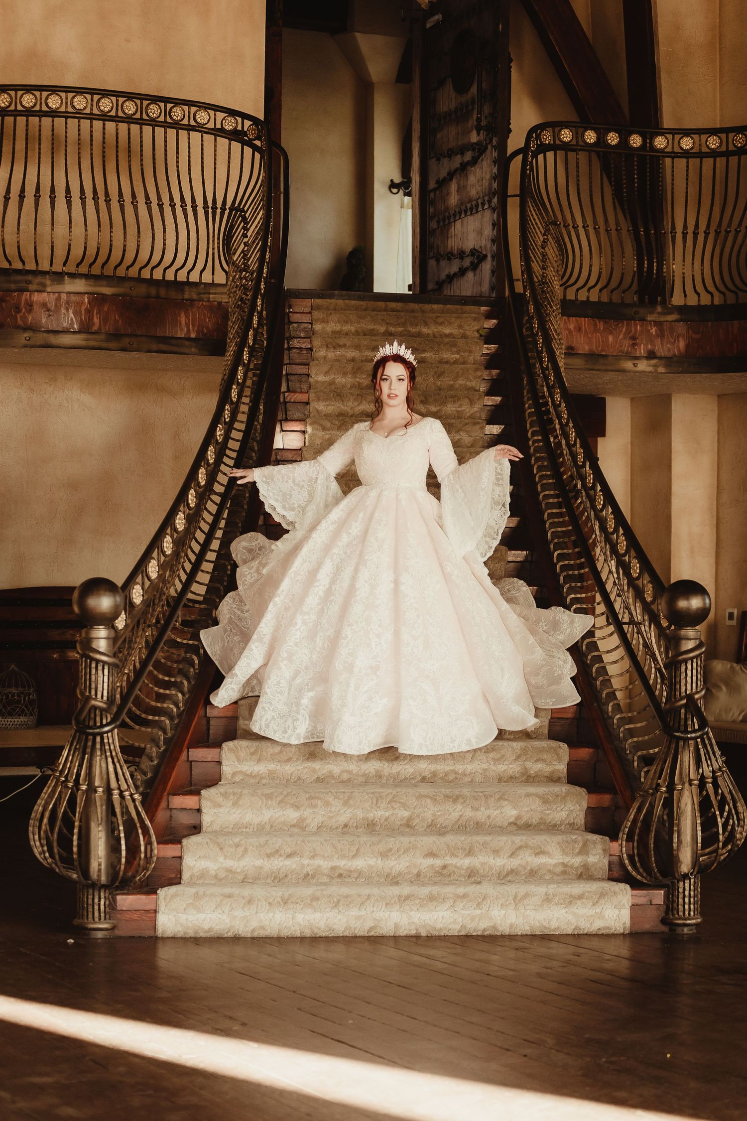 princess descends staircase in Wadley Farms Castle Pleasant Grove Utah