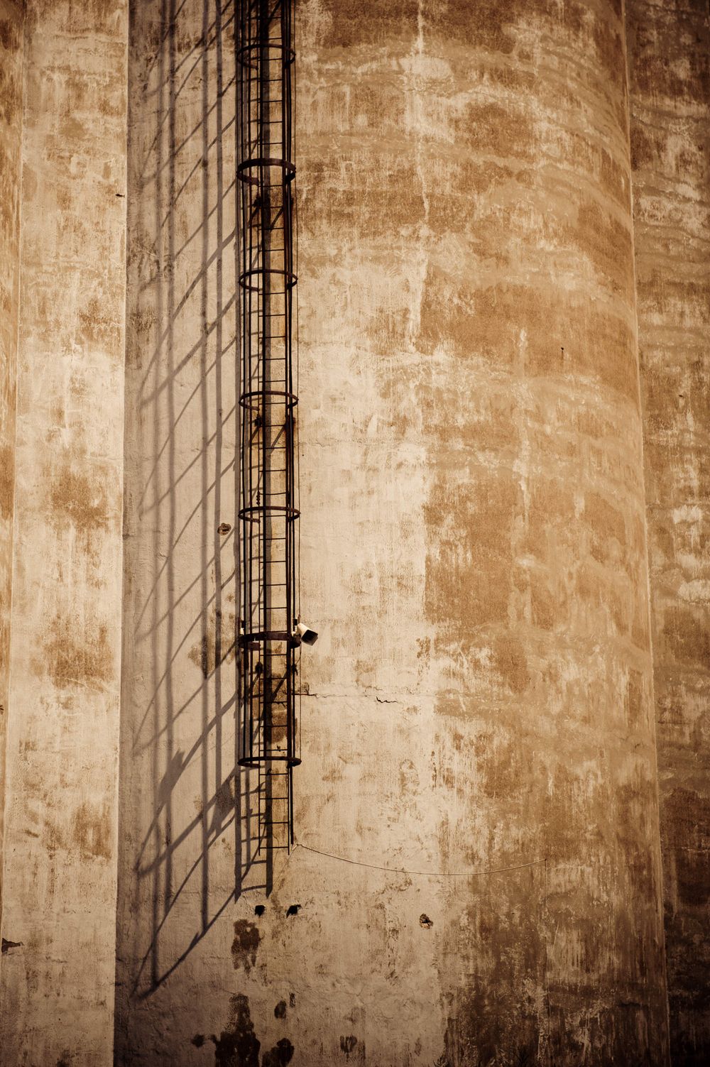 Grain Silo in Buffalo, NY with shadow from the ascending ladder