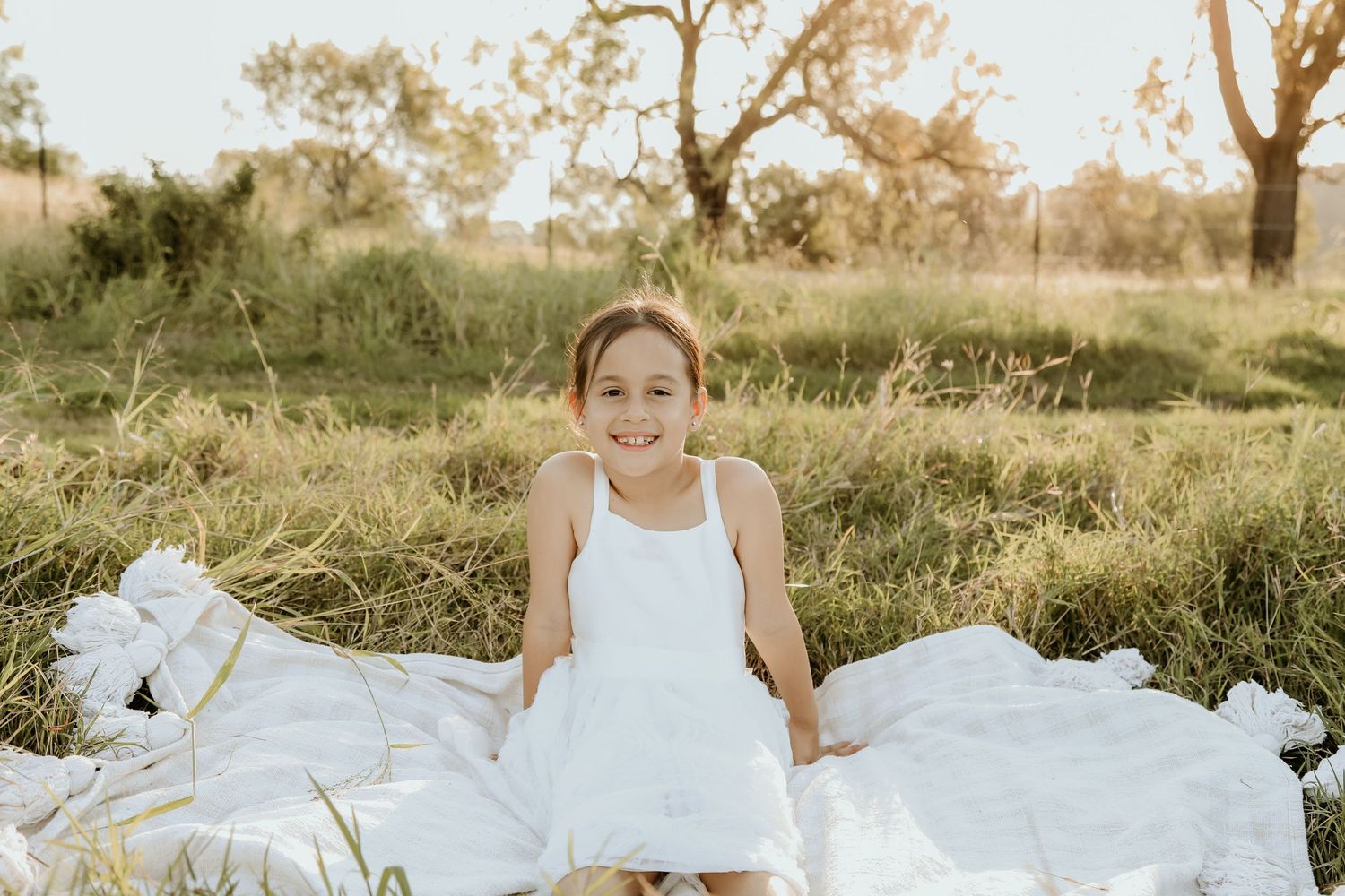 Portrait of daughter in a paddock