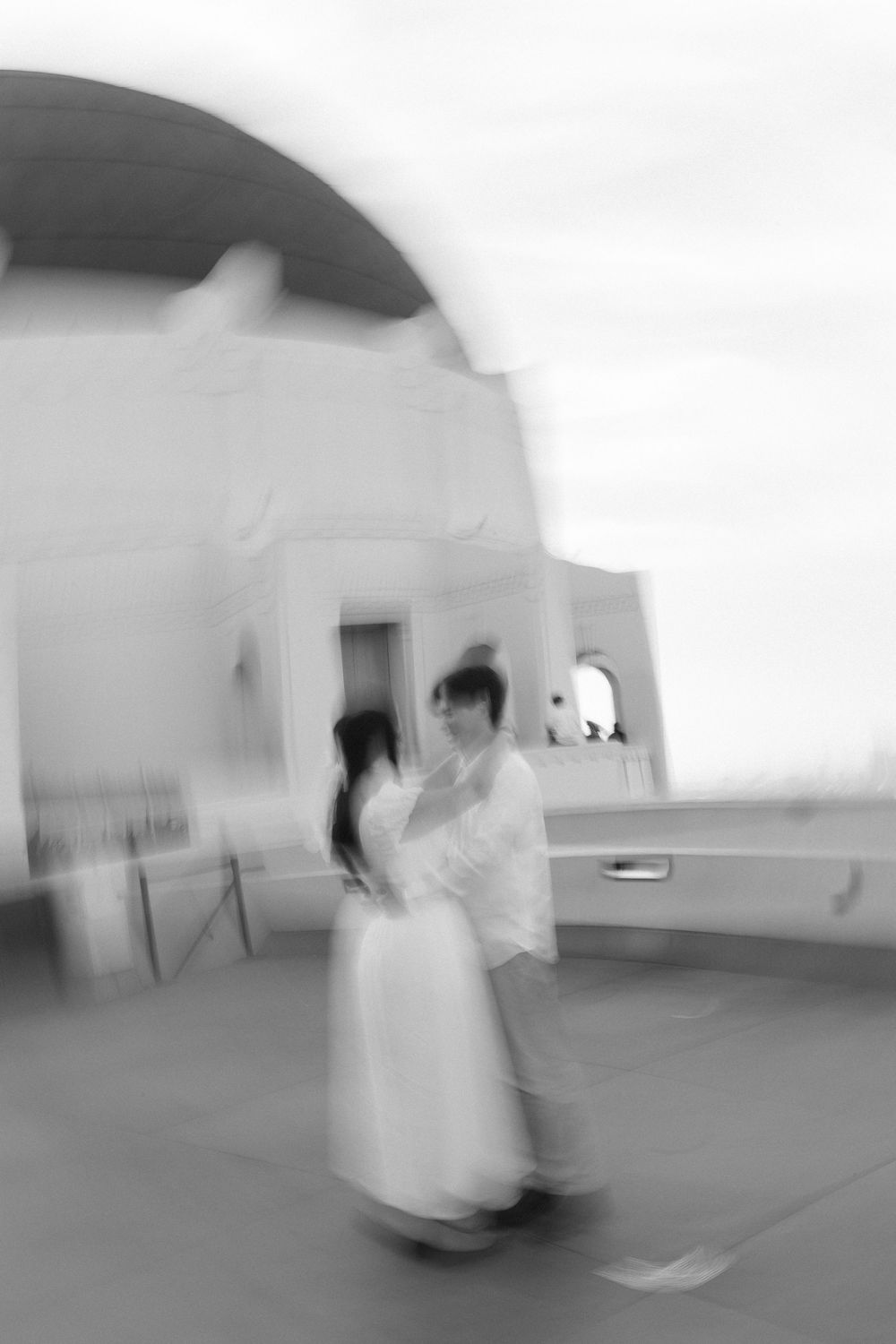 Artistic blur and movement during a Griffith Observatory engagement shoot, captured on digital by a Charlotte North Carolina wedding photo