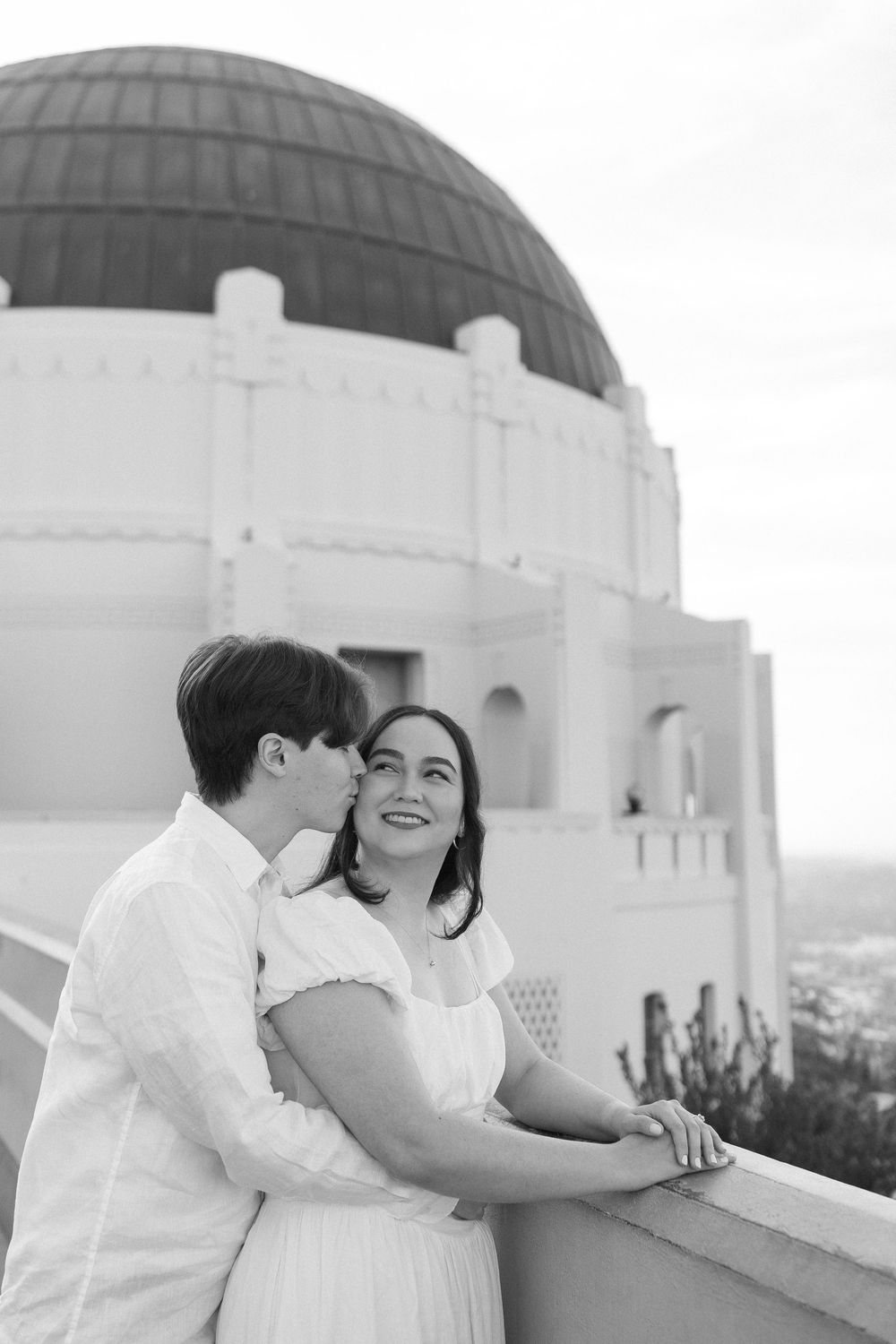 Candid Griffith Observatory engagement session on 35mm film, captured by a Charlotte NC documentary wedding photographer.