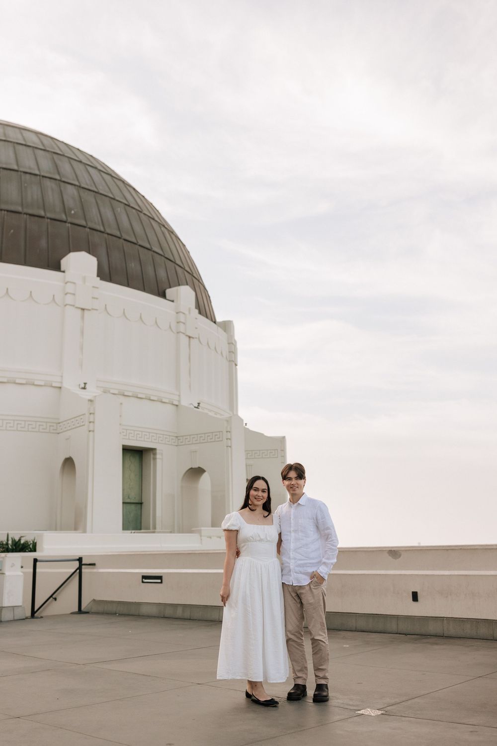 Candid Griffith Observatory engagement session on 35mm film, captured by a Charlotte North Carolina documentary wedding photographer.
