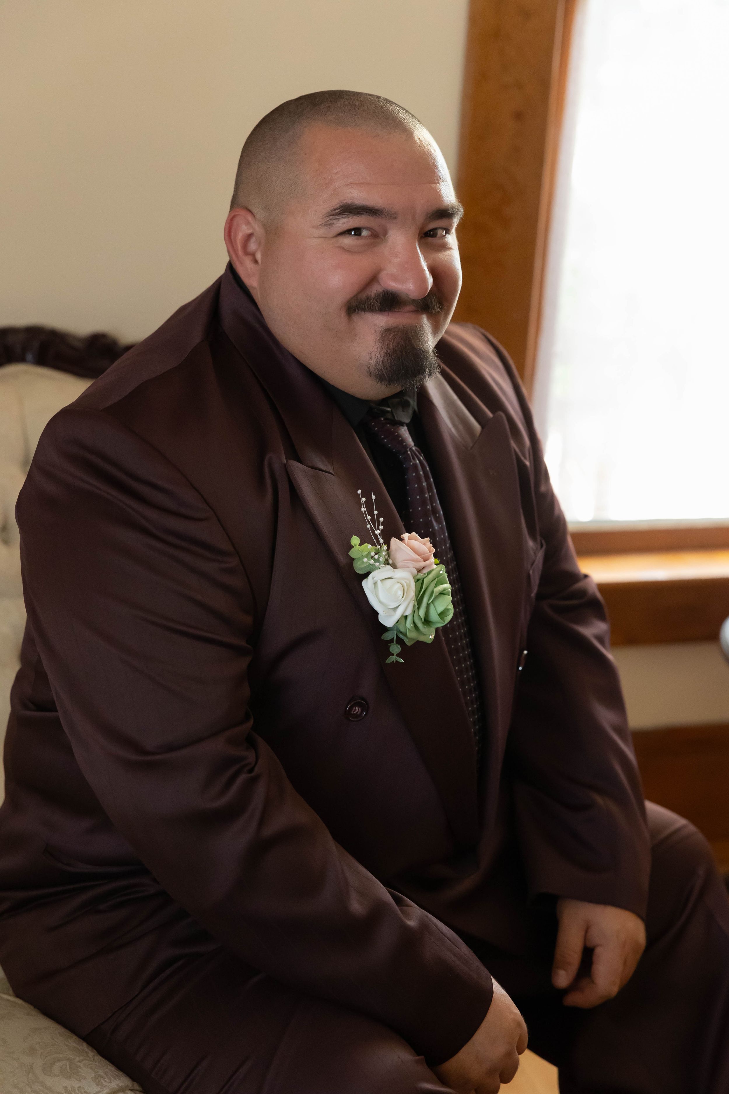 Hidden Gem wedding Meridian Idaho groom sitting in chair