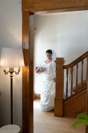 Hidden Gem wedding Meridian Idaho bride walking down staircase