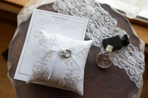 Hidden Gem wedding Meridian Idaho rings on pillow