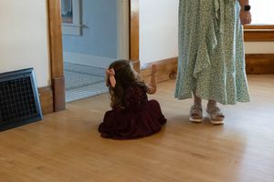 Hidden Gem wedding Meridian Idaho child looking up at adult