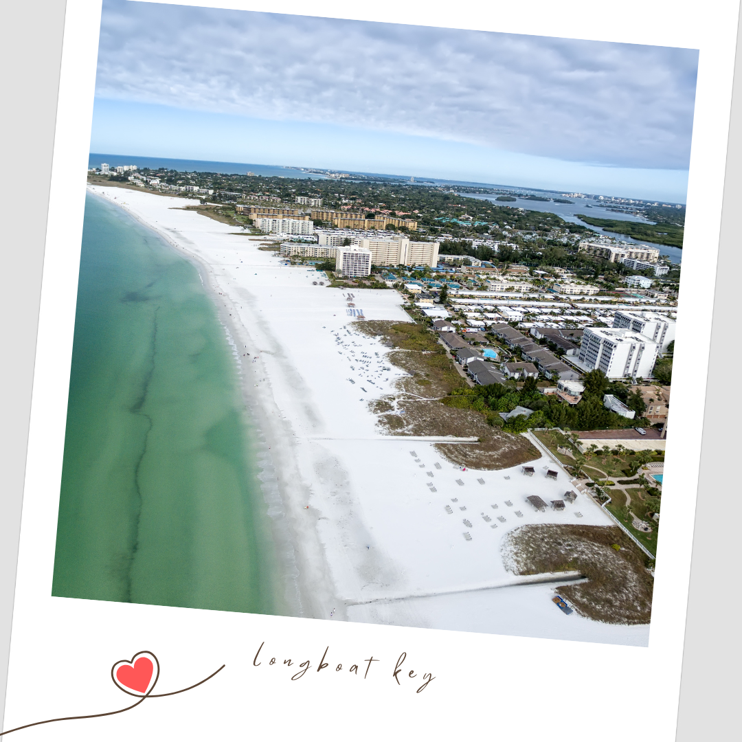 Aerial panoramic views of white sandy beaches and coastal buildings along the Gulf Coast shoreline on a sunny day. Longboat Key Florida
