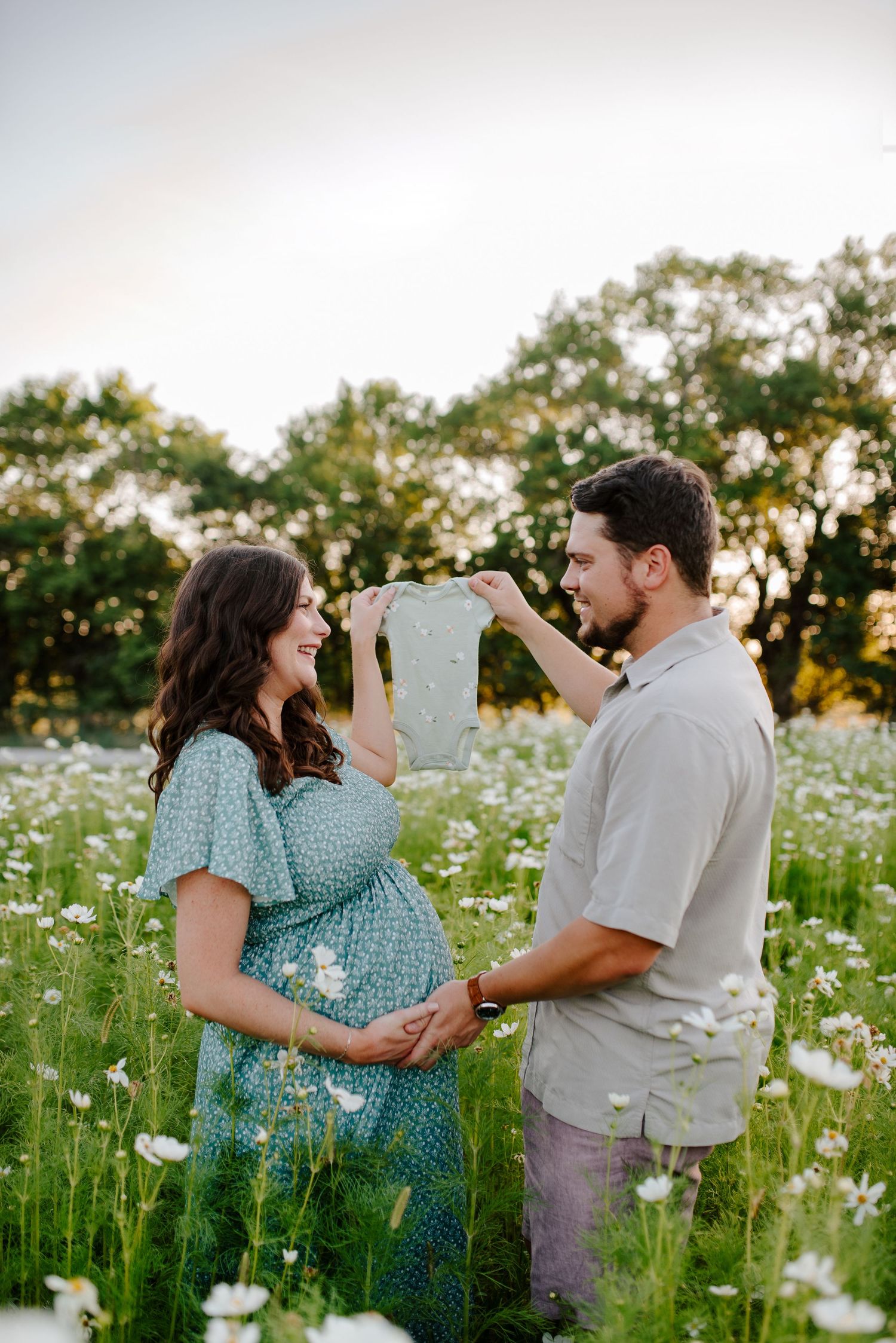 Flower field maternity session in Wichita Kansas by Jessica Nadine Photography