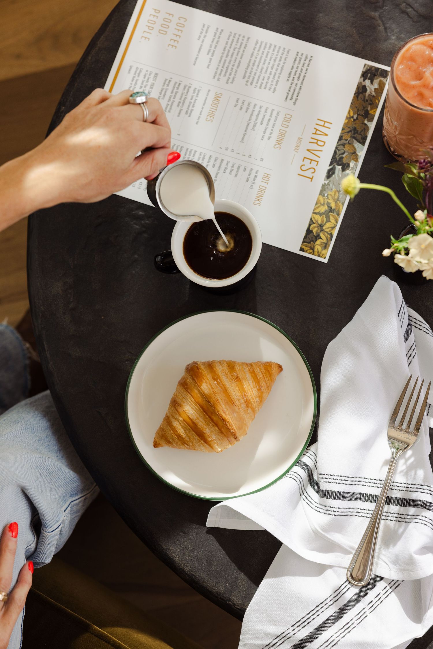 Croissant in lounge with coffee, Harvest Midway
