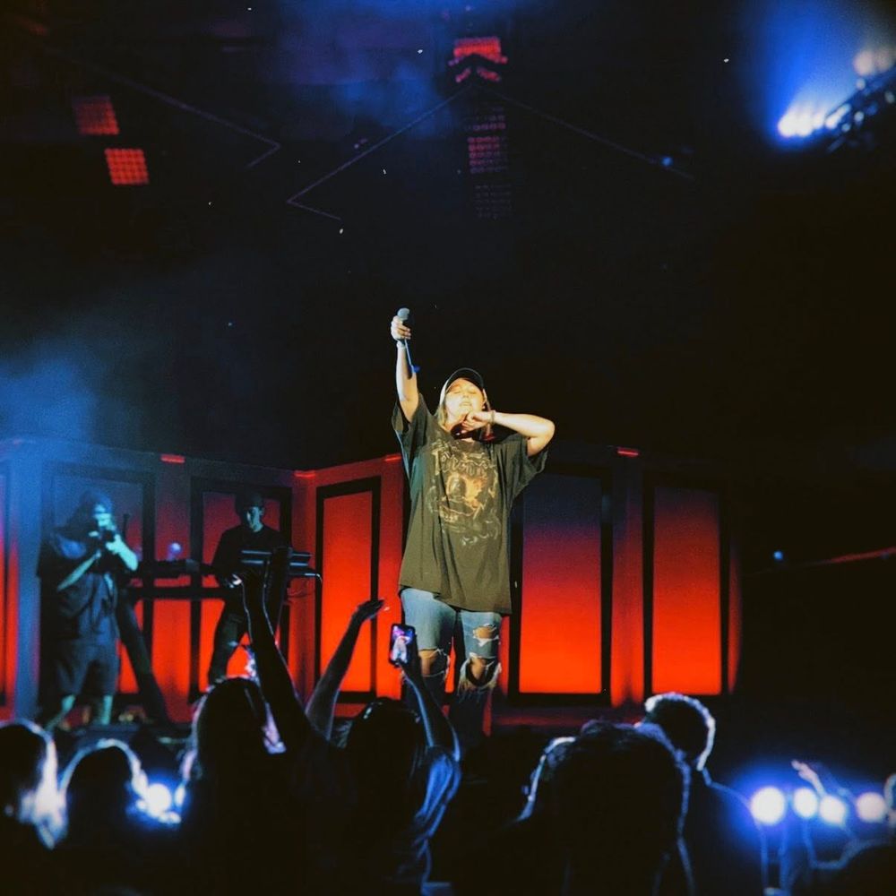 A woman singing on stage