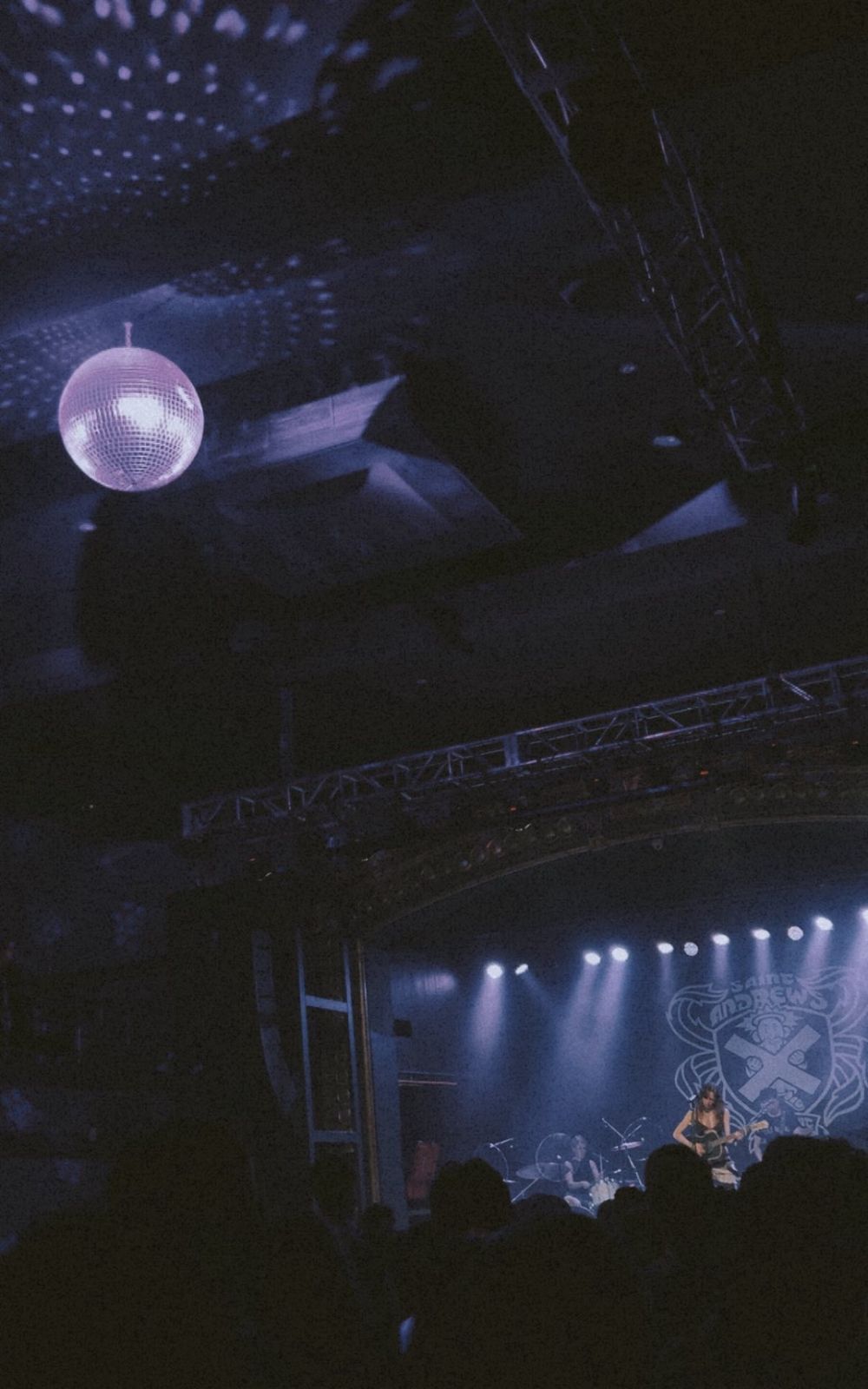 A woman singing on stage