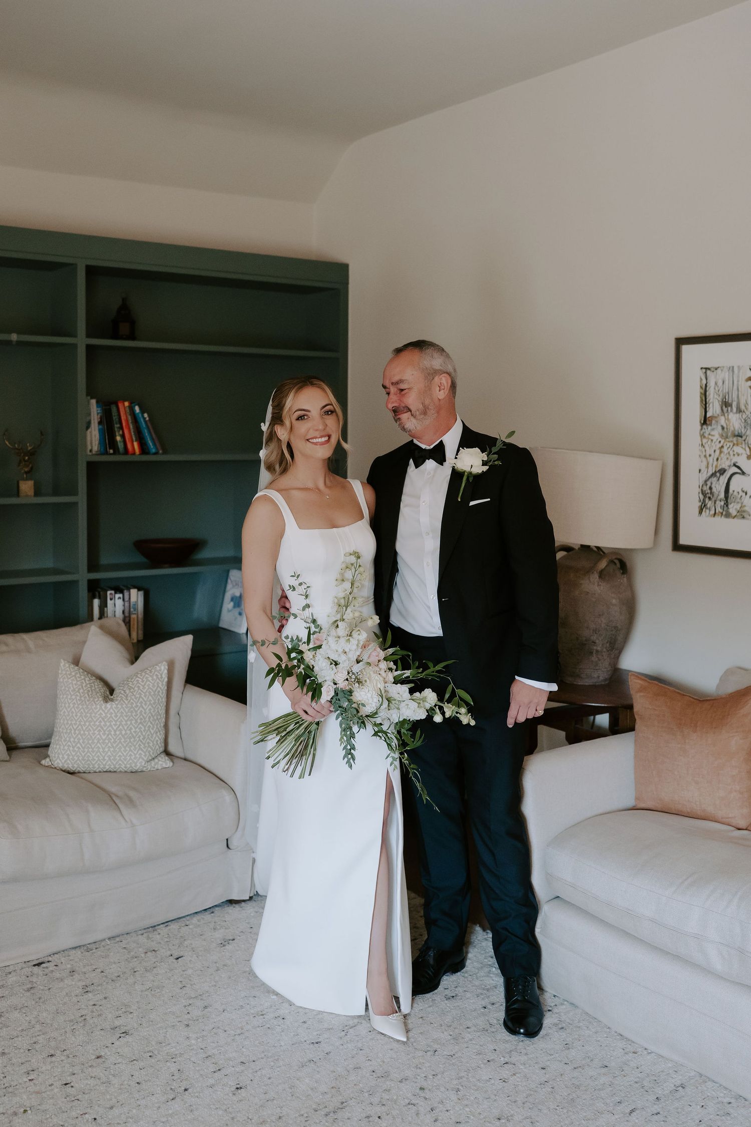 brides dad admiring bride at ivy lodge in cirencester