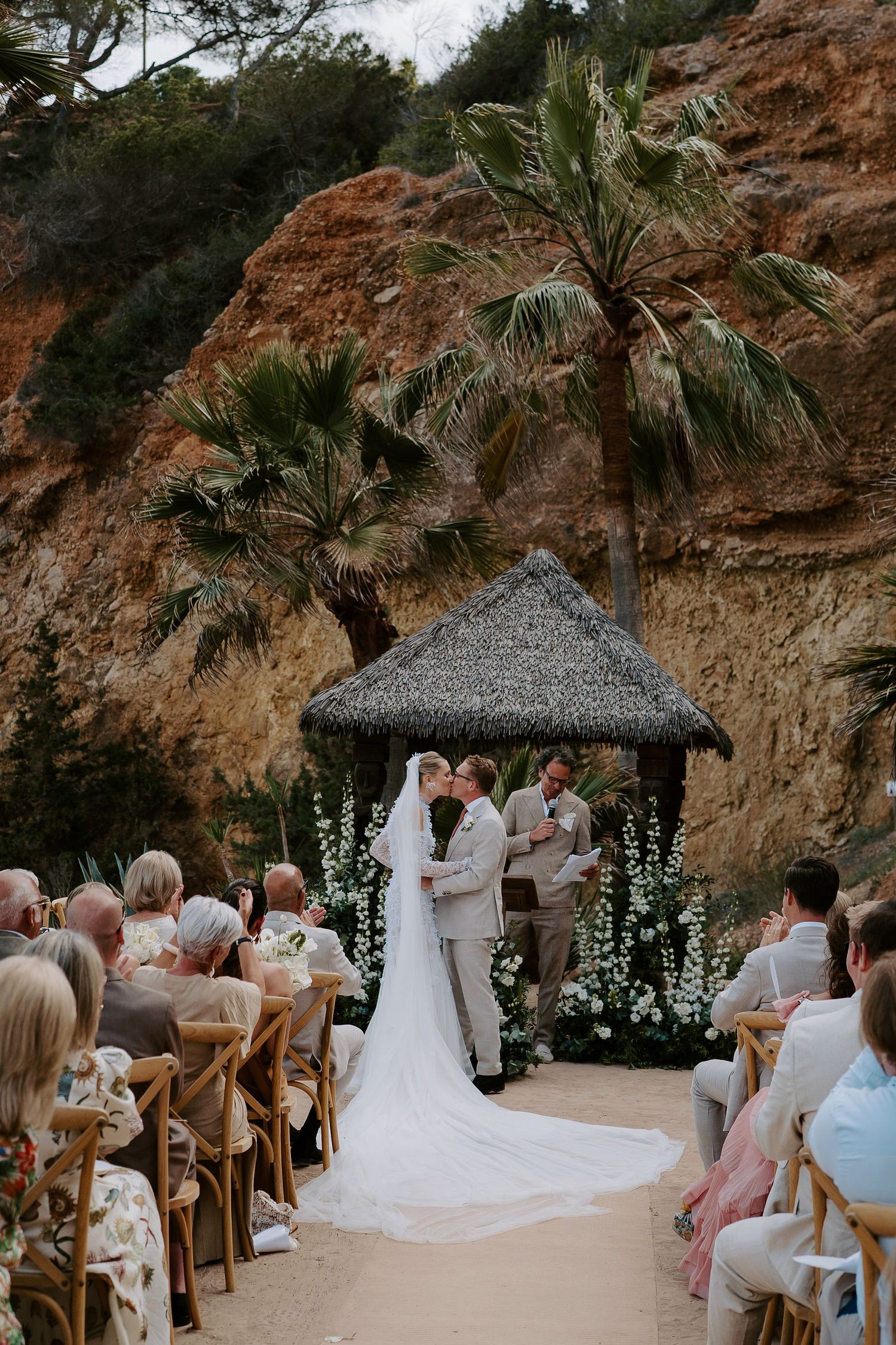 bride and groom sharing first kiss at amante ibiza