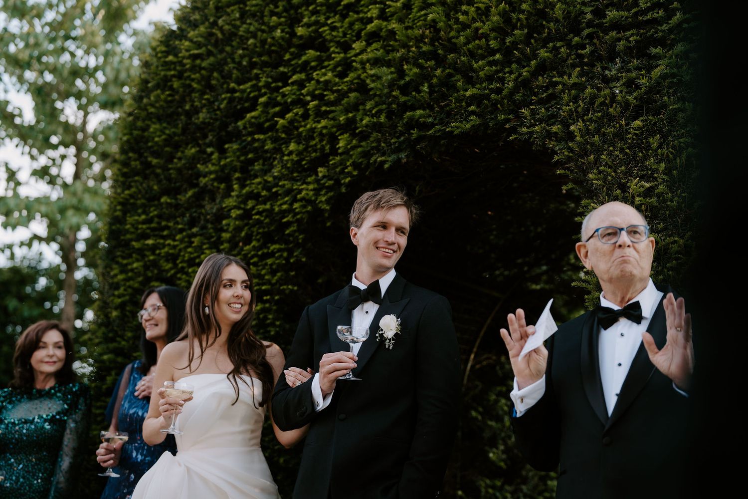 father of the bride giving his speech on the lawn at dewsall court in herefordshire