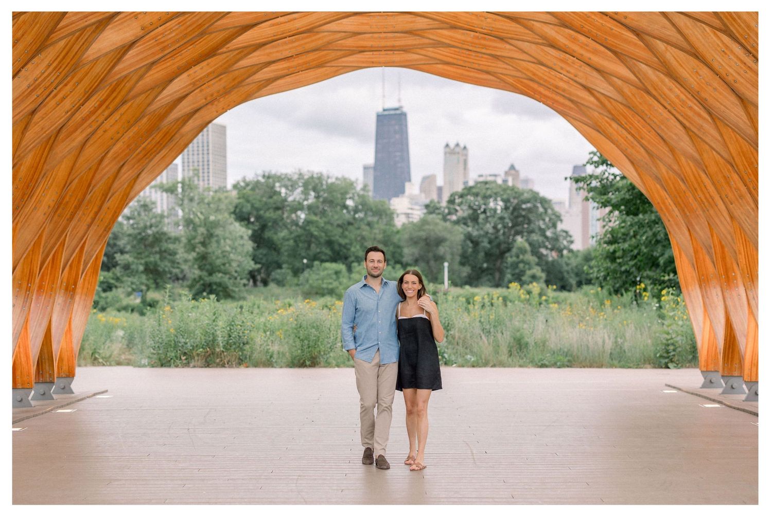 Lincoln Park proposal with Chicago skyline captured by a proposal photographer.