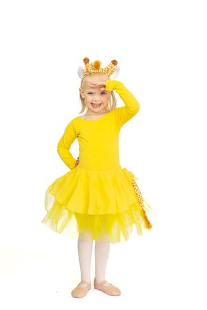 A young dancer in a bright yellow tutu dress and gold crown poses cheerfully against a white background.