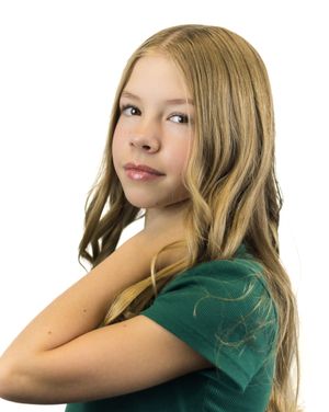 Four poses of a person in a green top against white background showing playful expressions.