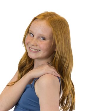 Person with red hair wearing a blue tank top posing playfully against white background in sequence.