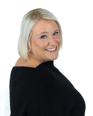 Series of four poses showing someone in black sweater with light hair against white background.