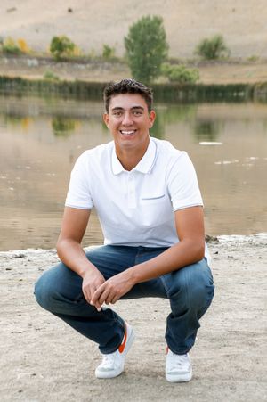 A series of portrait photos taken at a waterfront location as someone poses crouched down in casual attire.