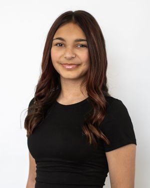 A person wearing a black t-shirt poses against a white background in a series of similar headshots.