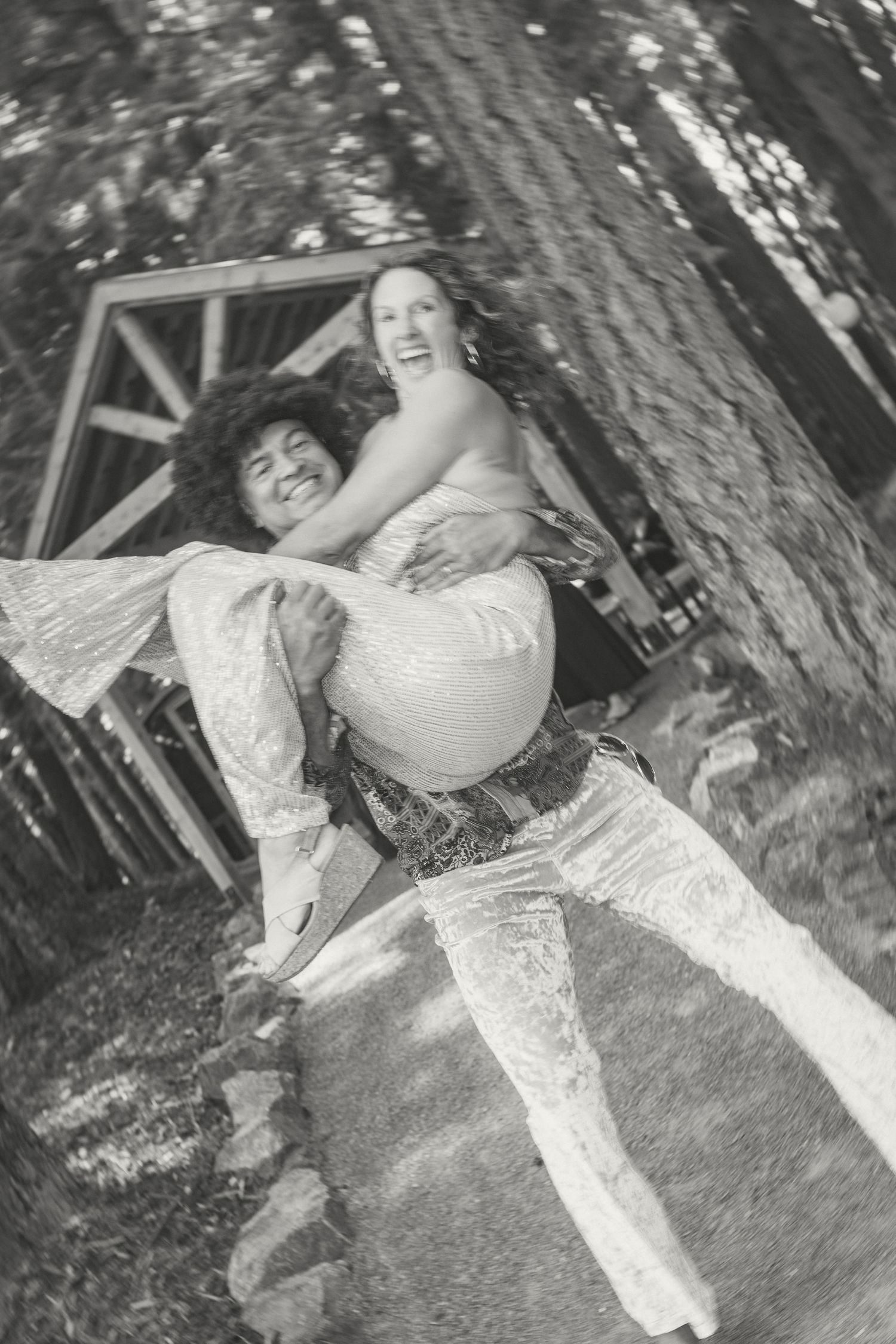 A series of black and white photos showing someone lying in a hammock between trees in a relaxed outdoor setting.
