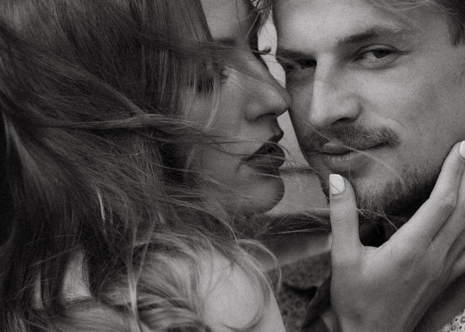 Close-up black and white portraits capturing tender romantic moments.