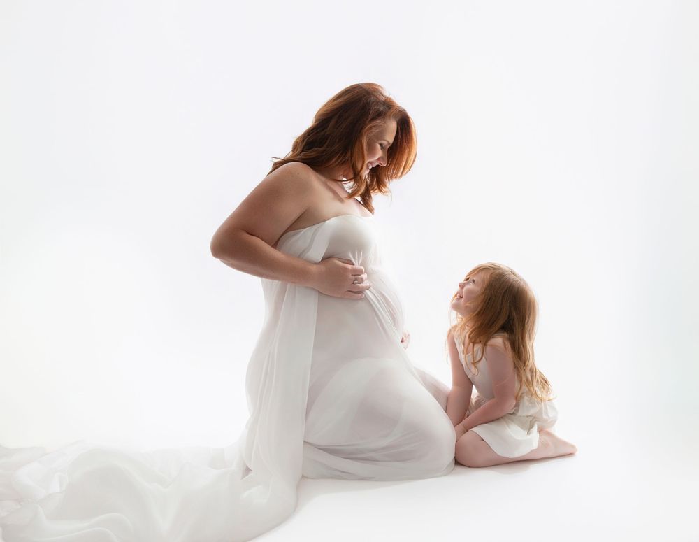 Glowing maternity portrait by Imageana in Bradenton-Sarasota — celebrating the beauty of pregnancy, motherhood, and unconditional love.