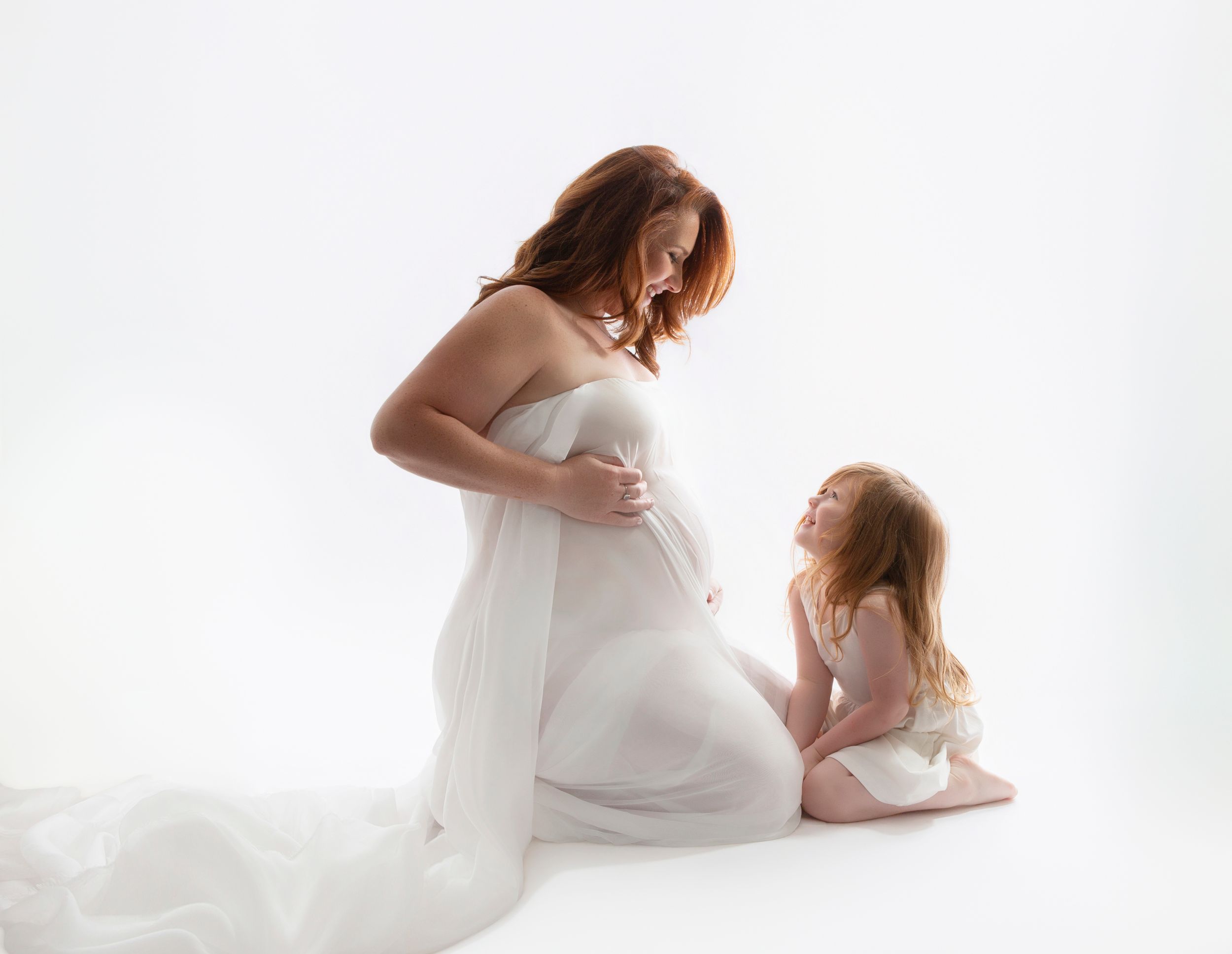 Glowing maternity portrait by Imageana in Bradenton-Sarasota — celebrating the beauty of pregnancy, motherhood, and unconditional love.