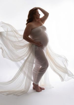 Glowing maternity portrait by Imageana in Bradenton-Sarasota — celebrating the beauty of pregnancy, motherhood, and unconditional love.