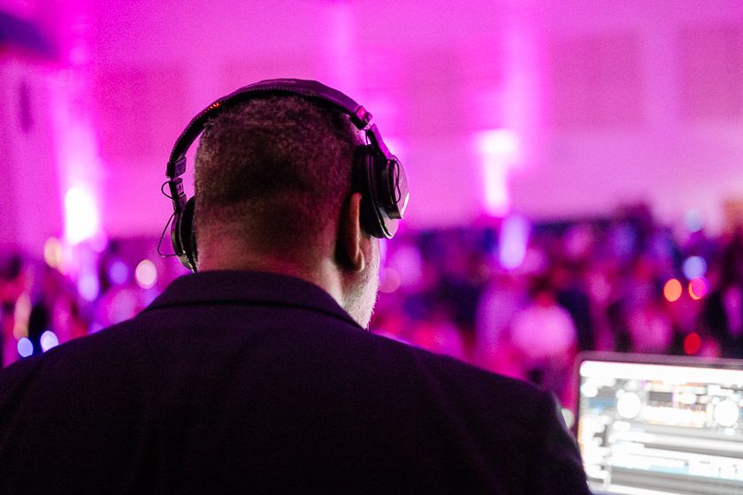 Pixs By Tina captures DJ Shizz performing for a Daddy Daugther dance in a bright pink atmosphere
